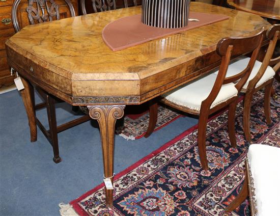 A 1930s figured walnut octagonal topped extending dining table, extends to 182 x 97cm